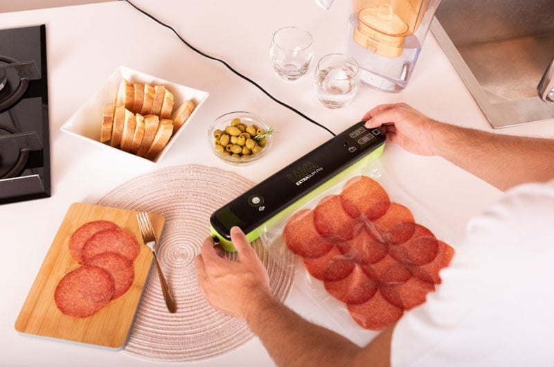 table with vacuum cured meats